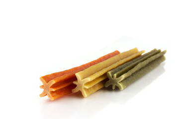 Three dental treats dog sticks. Isolted on white background.