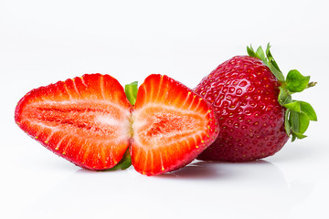 Cut berry of Strawberries isolated in white background