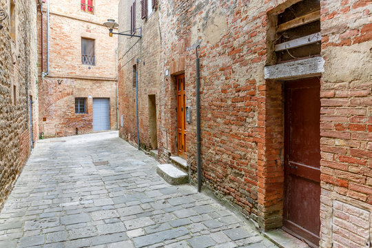 Doors in an old alley with paving stones