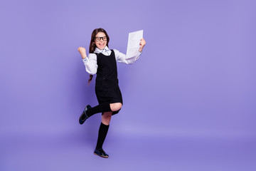 Full length body size view of nice attractive cheerful cheery glad confident wavy-haired pre-teen...