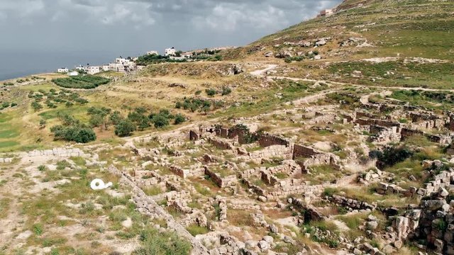 The ruins of Lower Herodion - the palace and the pool. Israel, the territory of the Palestinian Authority.