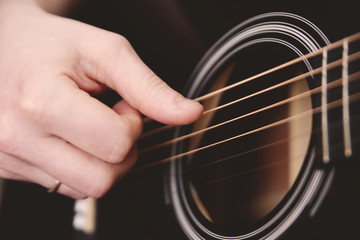 man playing guitar