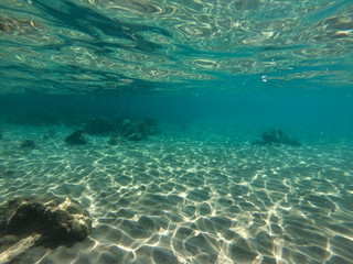 Fototapeta na wymiar Diving in the sea water. Underwater walking at the bottom of the seash.
