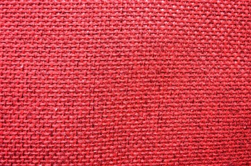 the woven texture of the fabric  bright red