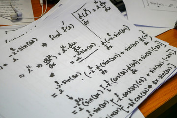Differentiation solving problem, equations outlines on white paper, Mathematics notation ,calculus...