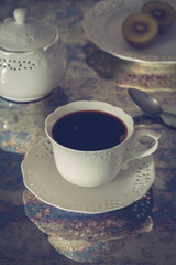 Obraz na płótnie Canvas a cup of brewed coffee served in a retro style