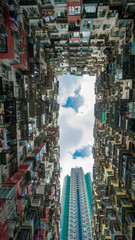 Hong Kong, China - May 19, 2019: Looking up at old building to sky in perspective view Architecture of Yick Fat Building located in east of Hong Kong's Central Business District