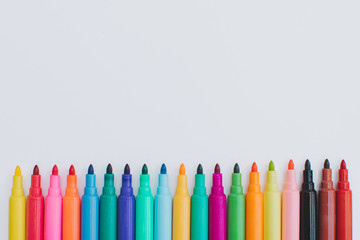 Open multicolored markers.