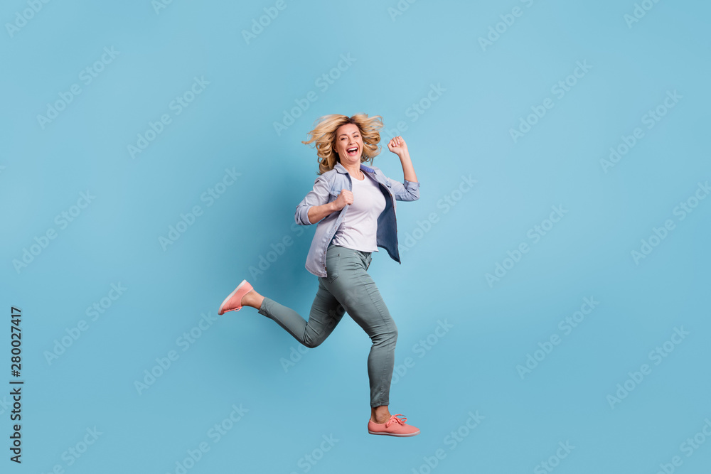 Poster Full size profile side photo of nice lady running laughing wearing pants trousers isolate dover blue background