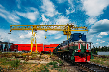 Freight train with cargo exits from warehouse