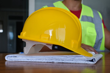 yellow construction helmet on construction project