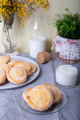 Cottage cheese homemade cookie in sugar topping with milk. Selective focus, close-up.