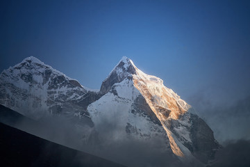 View of Mount Kangtega in Himalaya mountains at sunset. Khumbu valley, Everest region, Nepal
