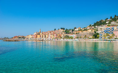 Fototapeta na wymiar View from the water of the city Menton in summer