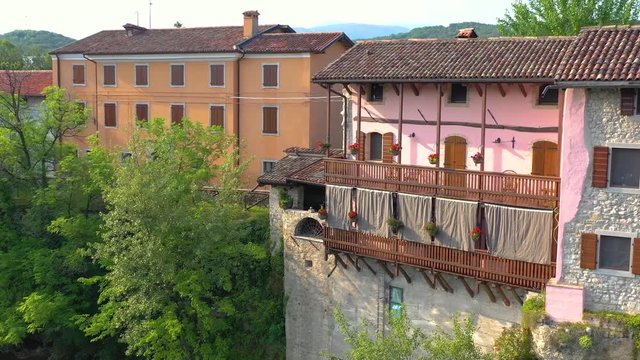 UDINE PROVINCE, ITALY - JUNE, 2019: Aerial panorama drone view of small town Cividale del Friuli beautiful architecture
