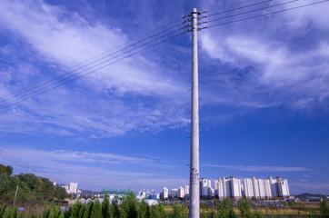 utility pole under blue sky