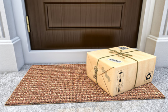 Express Package Delivery Service Concept, Parcel Box Wrapped In Craft Paper On The Door Mat Near The Entrance Door