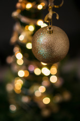 Grinchtree with a closeup on the main christmas ball