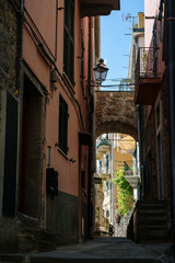 Narrow street in Corniglia town at Cinque Terre, Italy in the summer