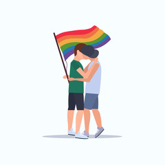 couple gays holding lgbt rainbow flag love parade pride festival concept two smiling guys embracing kissing male cartoon characters full length flat