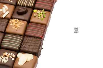 assorted chocolates confectionery with copy space, on white background