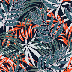 Abstract seamless pattern with colorful tropical leaves and plants on black background. Vector design. Jungle print. Flowers background. Printing and textiles. Exotic tropics. Fresh design.