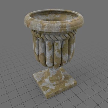 Worn garden urn