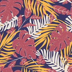 Fototapeta na wymiar Abstract seamless pattern with colorful tropical leaves and plants on purple background. Vector design. Jungle print. Flowers background. Printing and textiles. Exotic tropics. Fresh design.