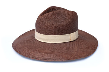Vintage brown Straw hat fasion with white ribbon isolated on white background. This has clipping path