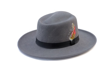 Vintage gray hat fasion with black ribbon and feather isolated on white background. This has clipping path
