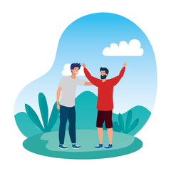 happy young men friends celebrating in the park