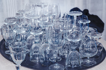 Many of Clean empty wine glasses on the table. Soft focus