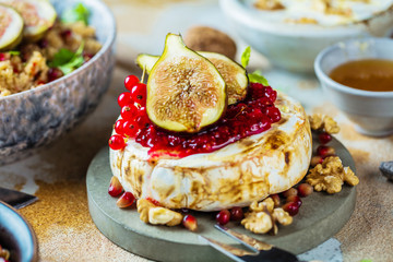 Camembert cheese with fresh fig walnuts and honey