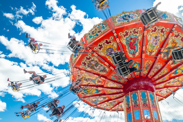 Tampere, Finland - 24 June 2019: Ride Swing Carousel in motion in amusement park Sarkanniemi on...