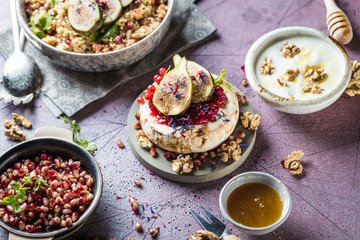 Camembert cheese with fresh fig walnuts and honey