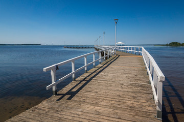 Obraz premium Footbridge on the Szczecinski lagoon in Stepnica, Poland