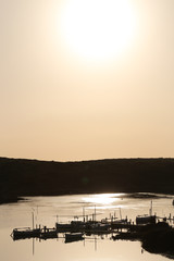 Little fishermen jetty in the evening. Menorca. Spain