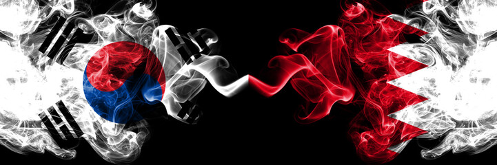 South Korea vs Bahrain, Bahrani smoky mystic flags placed side by side. Thick colored silky abstract smoke flags of South Korean and Bahrain, Bahrani