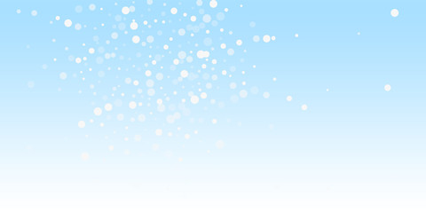 Fototapeta premium White dots Christmas background. Subtle flying sno