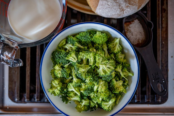 broccoli and fresh bread on the stove