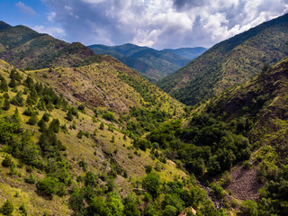 Aerial view of mountain and forest, cloudy day. Near the Ibar river and Maglic castle in Serbia