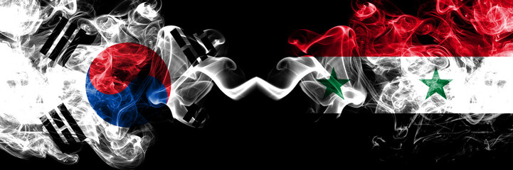 South Korea vs Syria, Syrian smoky mystic flags placed side by side. Thick colored silky abstract smoke flags of South Korean and Syria, Syrian