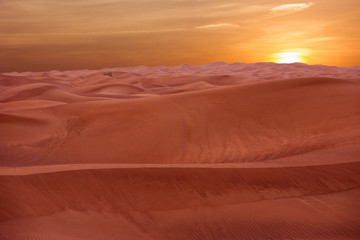 Naklejka na ściany i meble Sand desert sunset view, United Arab Emirates