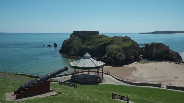 Looking out from Castle Hill towards South Beach and Cladey Island Tenby Pembrokeshire Wales 