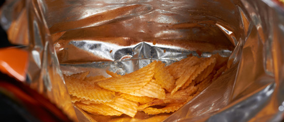 Potato chips in plastic bag party,horizontal