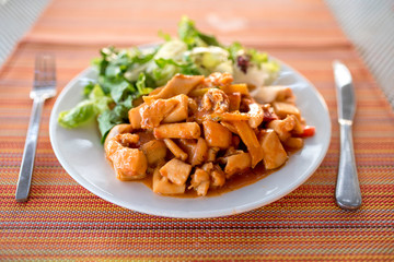 Close up of plate full of sea food and green salad