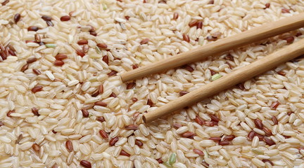 Integral rice and asian wooden chopsticks texture and background