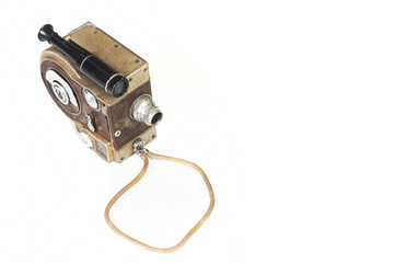 Vintage old video camera isolated on white background.