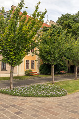 Public park with flowers in Budapest in a cloudy day.