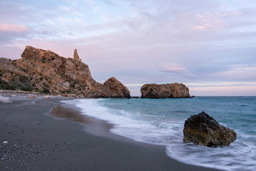 Fototapeta na wymiar Sunset on the beach of La Rijana, Costa Tropical (Granada) Spain